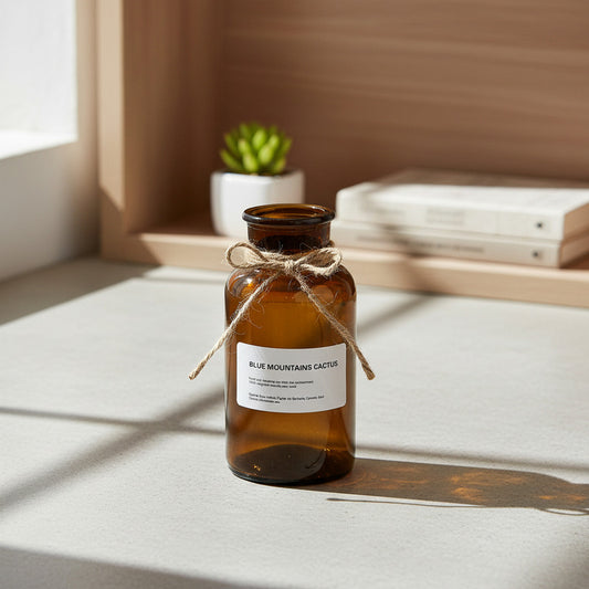 Florero De Vidrio Marrón Tipo Botella 16,5 cm